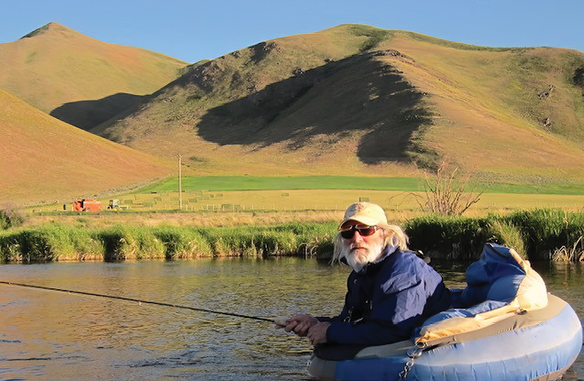 Tom Lampl sitting in a fishing tube in Silver Creek Idaho